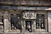 Prambanan - Candi Lara Jonggrang, kinara-kinari panels a composition of a lion with the tree of heaven and a pair of kinnara. 